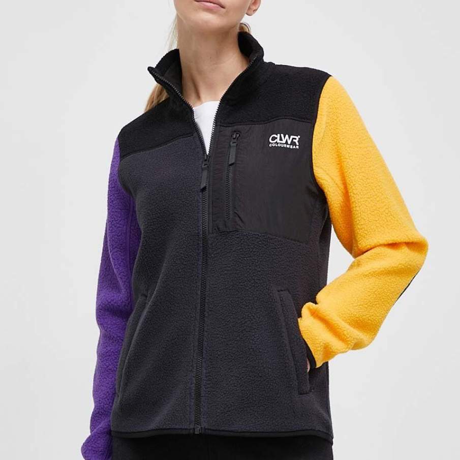 Hanorac fleece Colourwear în stil colourblock, cu o mânecă galbenă, una violet, și guler pentru protecție împotriva vântului